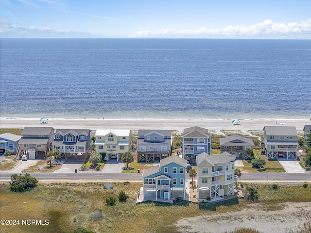 aerial view with a residential view and a water view