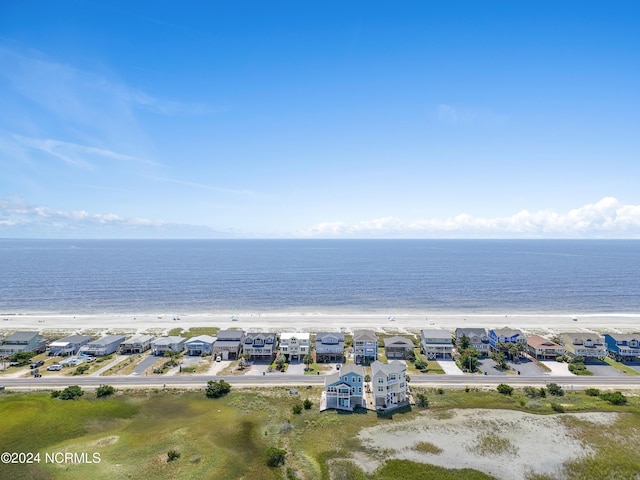 birds eye view of property with a water view and a residential view