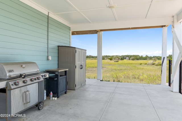 view of patio featuring a grill