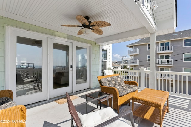 exterior space featuring outdoor lounge area and ceiling fan