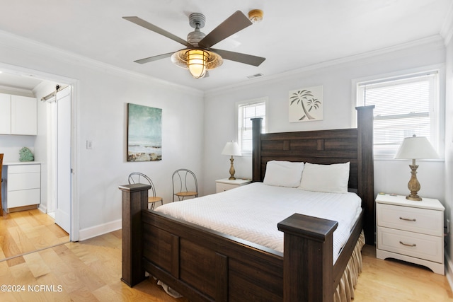 bedroom featuring ceiling fan, ornamental molding, and light hardwood / wood-style flooring