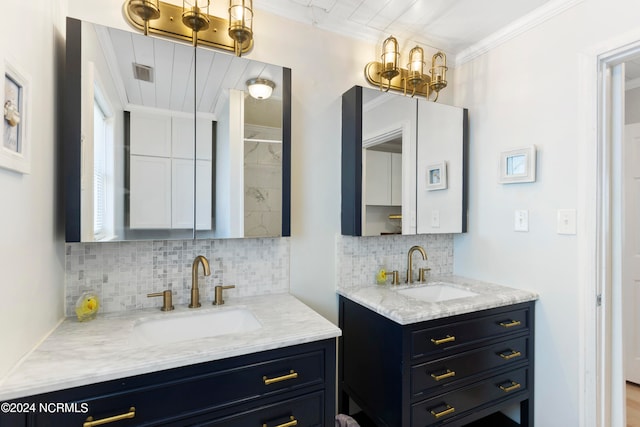 bathroom featuring crown molding, vanity, and backsplash