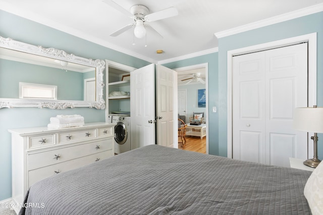 bedroom with a closet, wood-type flooring, washer / dryer, ceiling fan, and ornamental molding