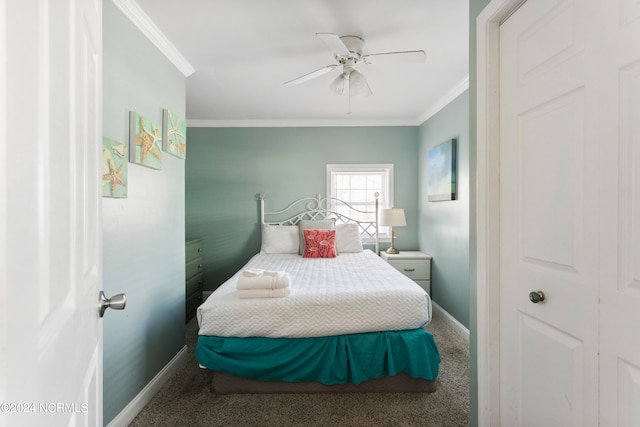 bedroom with crown molding, ceiling fan, and carpet floors