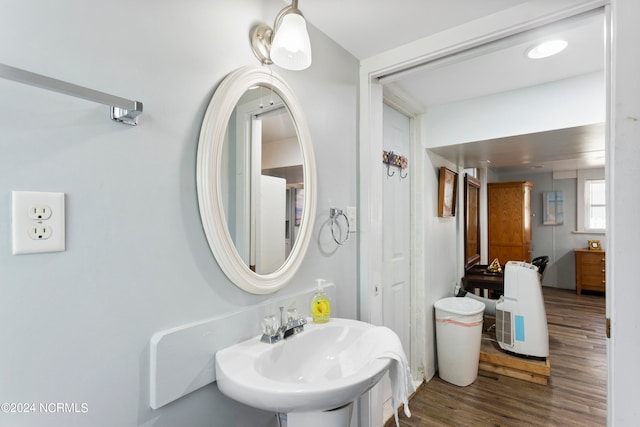 bathroom featuring hardwood / wood-style floors and sink