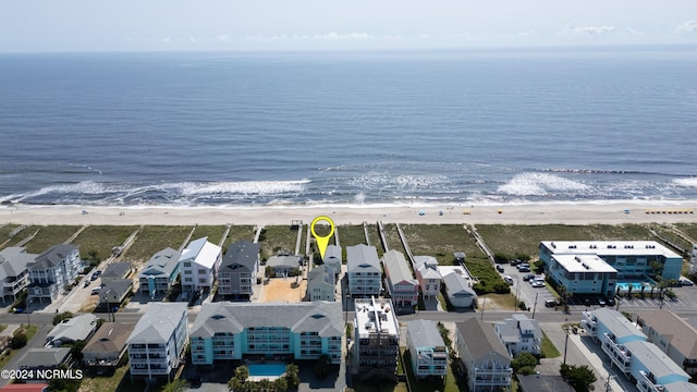 aerial view featuring a beach view and a water view