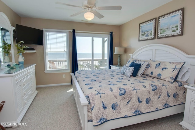 carpeted bedroom with access to exterior and ceiling fan