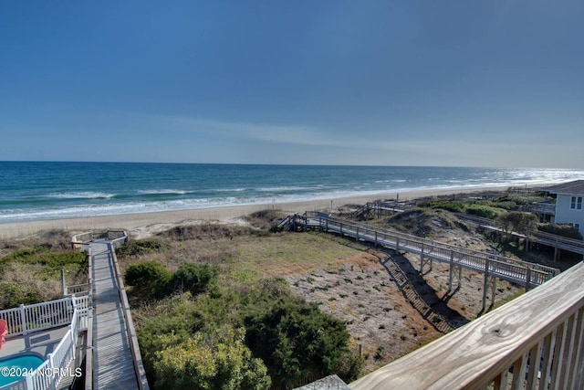 property view of water featuring a beach view