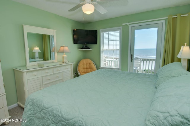 carpeted bedroom with access to outside and ceiling fan