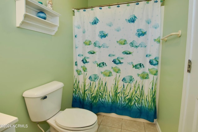 bathroom featuring tile patterned flooring, vanity, toilet, and a shower with curtain