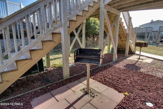 view of yard with a wooden deck