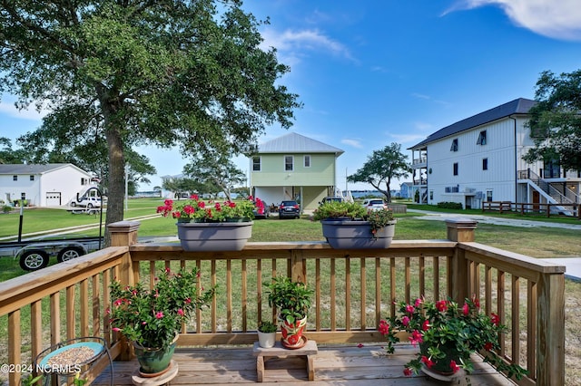 deck featuring a lawn