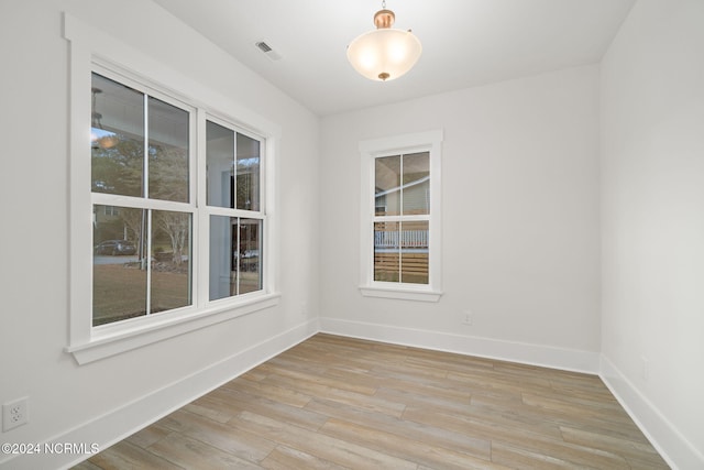 empty room with light wood-type flooring