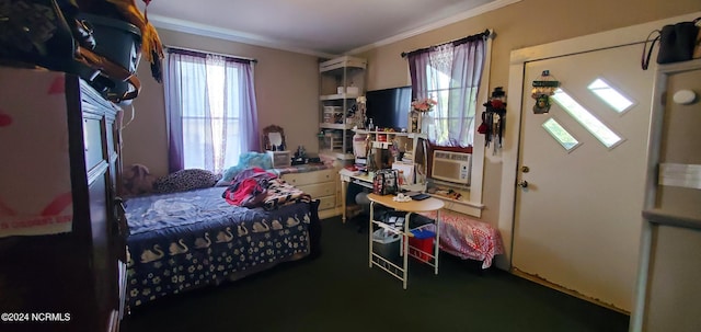 bedroom featuring cooling unit and crown molding