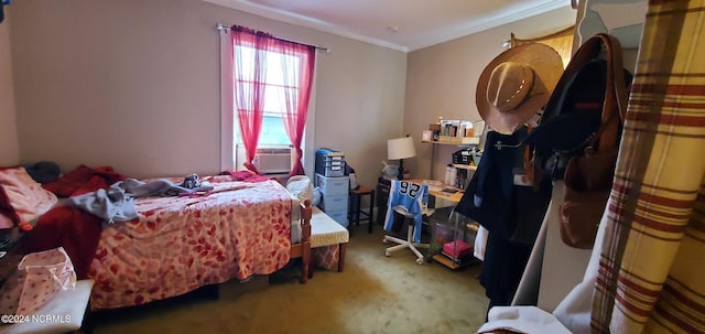 carpeted bedroom featuring ornamental molding and cooling unit