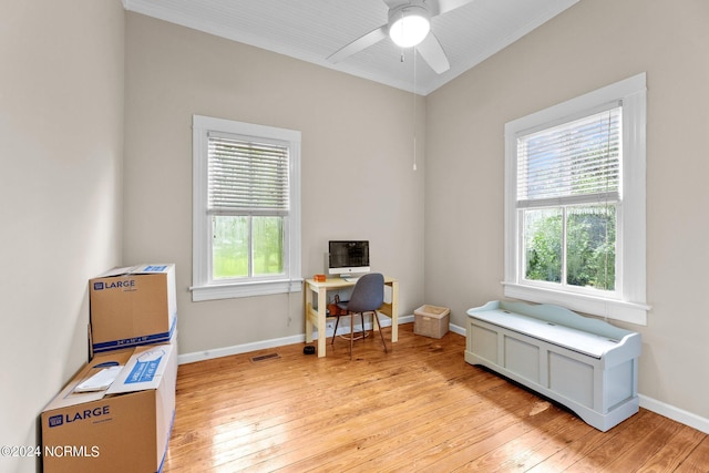 office area featuring visible vents, ceiling fan, light wood-type flooring, and baseboards