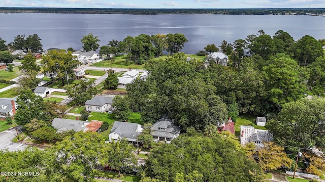 birds eye view of property featuring a residential view and a water view