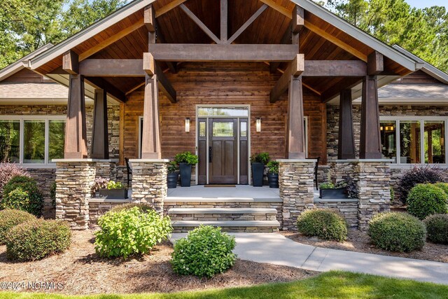 entrance to property with covered porch