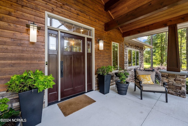 entrance to property with a porch