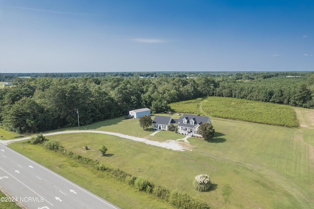 bird's eye view with a forest view and a rural view