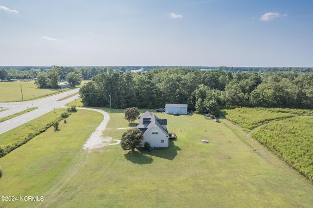 birds eye view of property featuring a rural view