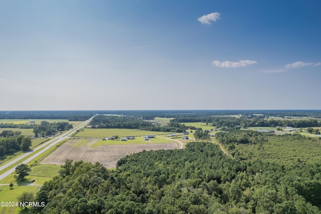 birds eye view of property featuring a rural view
