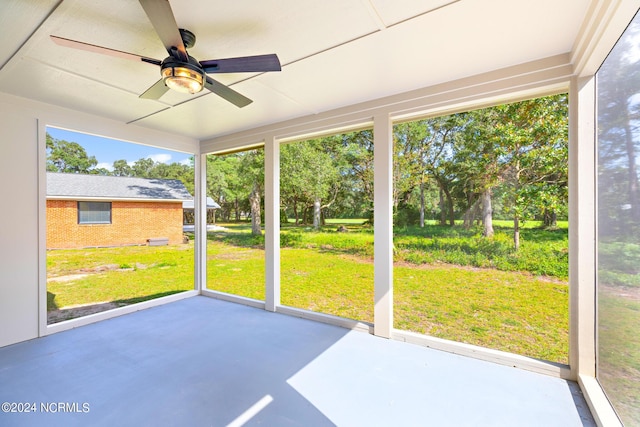 31 Augusta Dr, Oak Island, NC 28465 - unfurnished sunroom with a ceiling fan