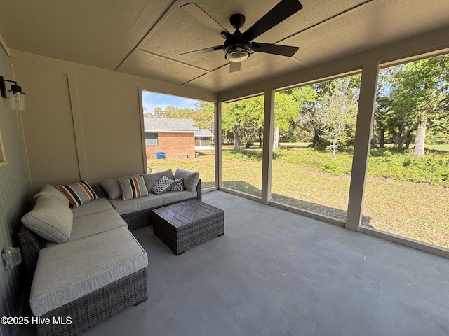 31 Augusta Dr, Oak Island, NC 28465 - sunroom with ceiling fan, a wealth of natural light, and an outdoor living space