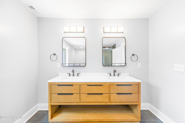 bathroom featuring vanity and tile patterned flooring