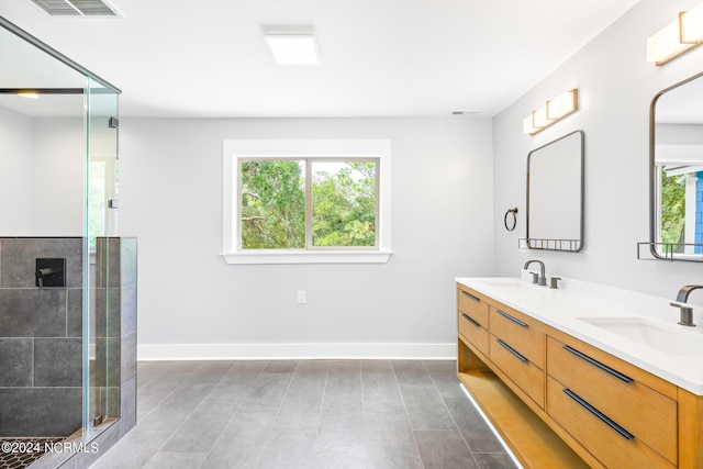 31 Augusta Dr, Oak Island, NC 28465 - bathroom featuring double vanity, baseboards, and a sink