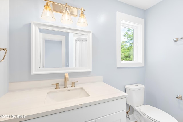 31 Augusta Dr, Oak Island, NC 28465 - full bathroom with toilet and vanity