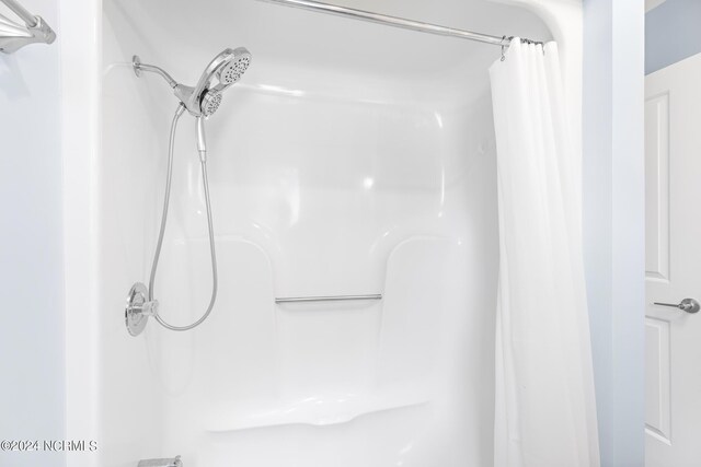 31 Augusta Dr, Oak Island, NC 28465 - bathroom with curtained shower