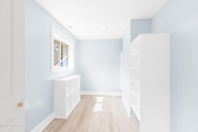 31 Augusta Dr, Oak Island, NC 28465 - corridor featuring baseboards and light wood-type flooring