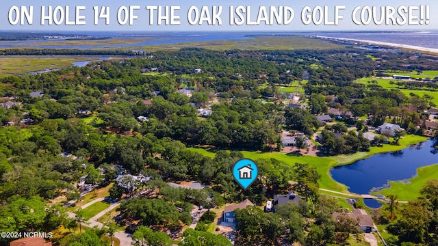 31 Augusta Dr, Oak Island, NC 28465 - birds eye view of property with a water view