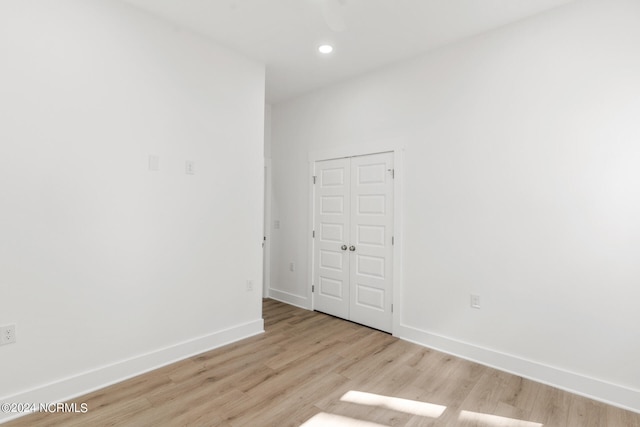 unfurnished room featuring light hardwood / wood-style flooring