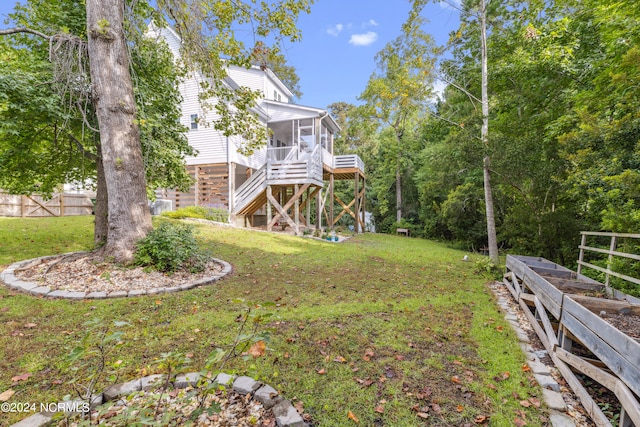 view of yard with a sunroom