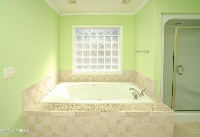 bathroom featuring shower with separate bathtub, ornamental molding, and tile patterned floors