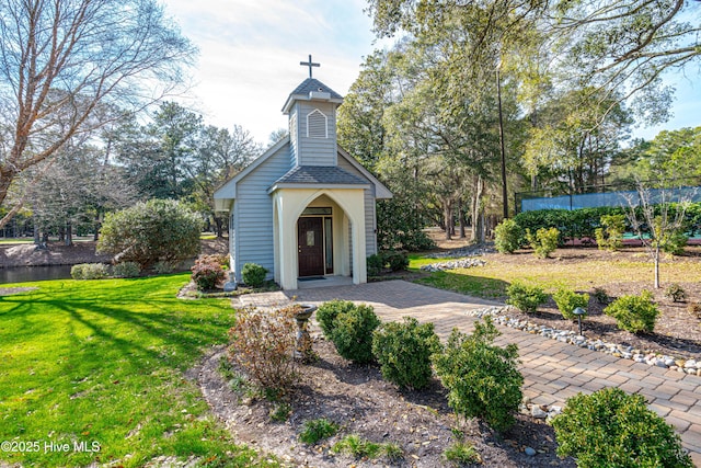 exterior space with a yard