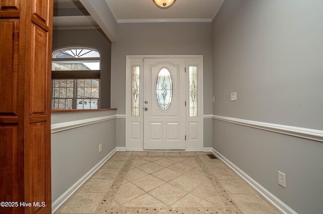 entrance foyer with ornamental molding