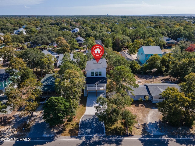 bird's eye view with a view of trees and a residential view