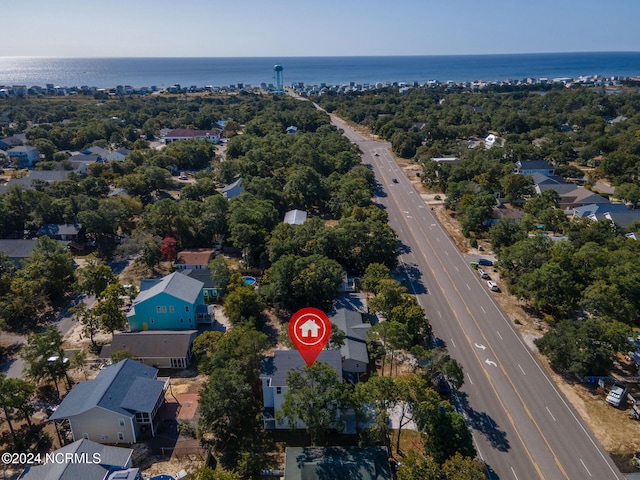 bird's eye view featuring a water view and a residential view