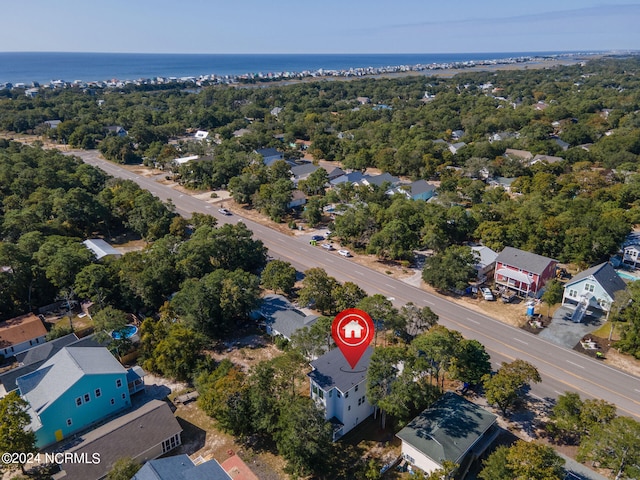birds eye view of property with a residential view and a water view