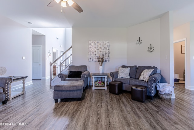 living room with ceiling fan and wood-type flooring