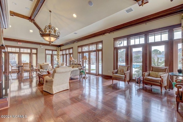 living room with french doors, high vaulted ceiling, and hardwood / wood-style flooring