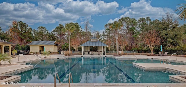 view of pool with a gazebo, a jacuzzi, and a patio area