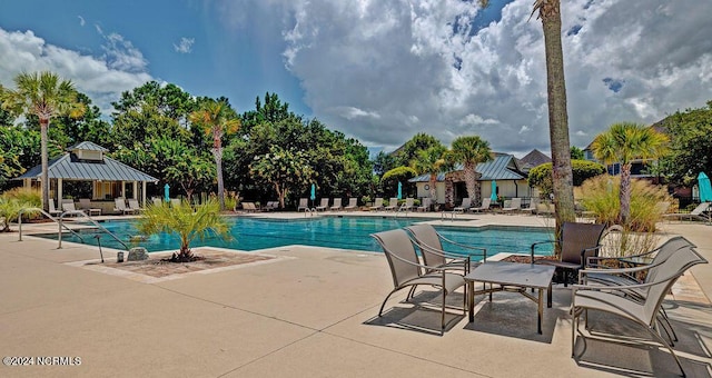 view of pool with a gazebo and a patio