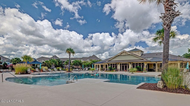 view of pool featuring a patio area