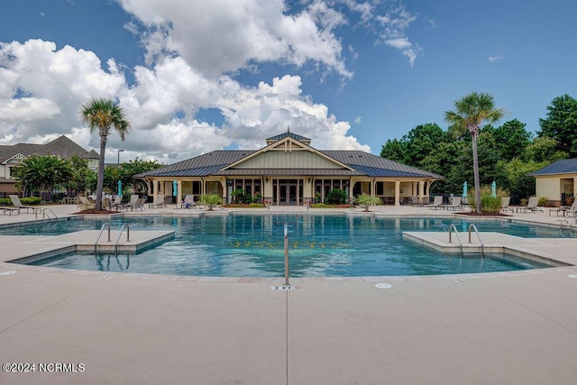 view of pool featuring a patio area