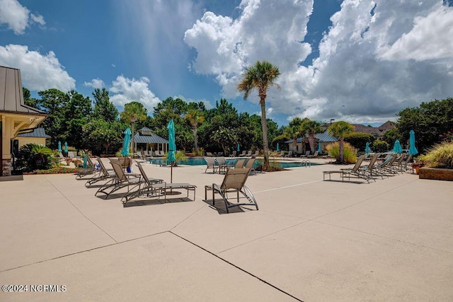 view of pool featuring a gazebo and a patio area