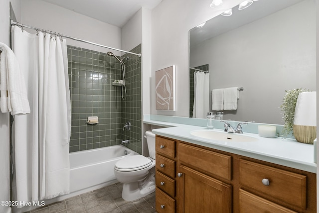 full bathroom featuring vanity, shower / bath combination with curtain, and toilet